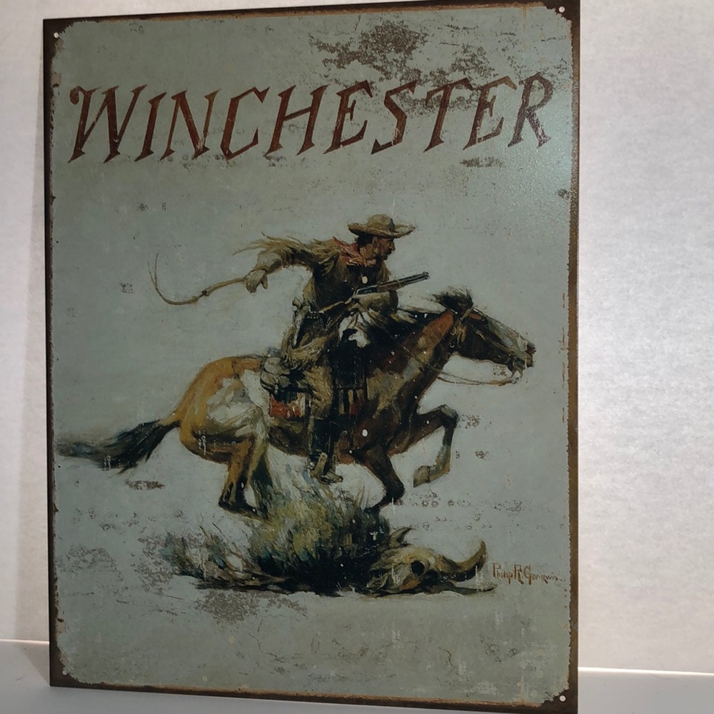 Winchester metal wall art cowboy on a horse